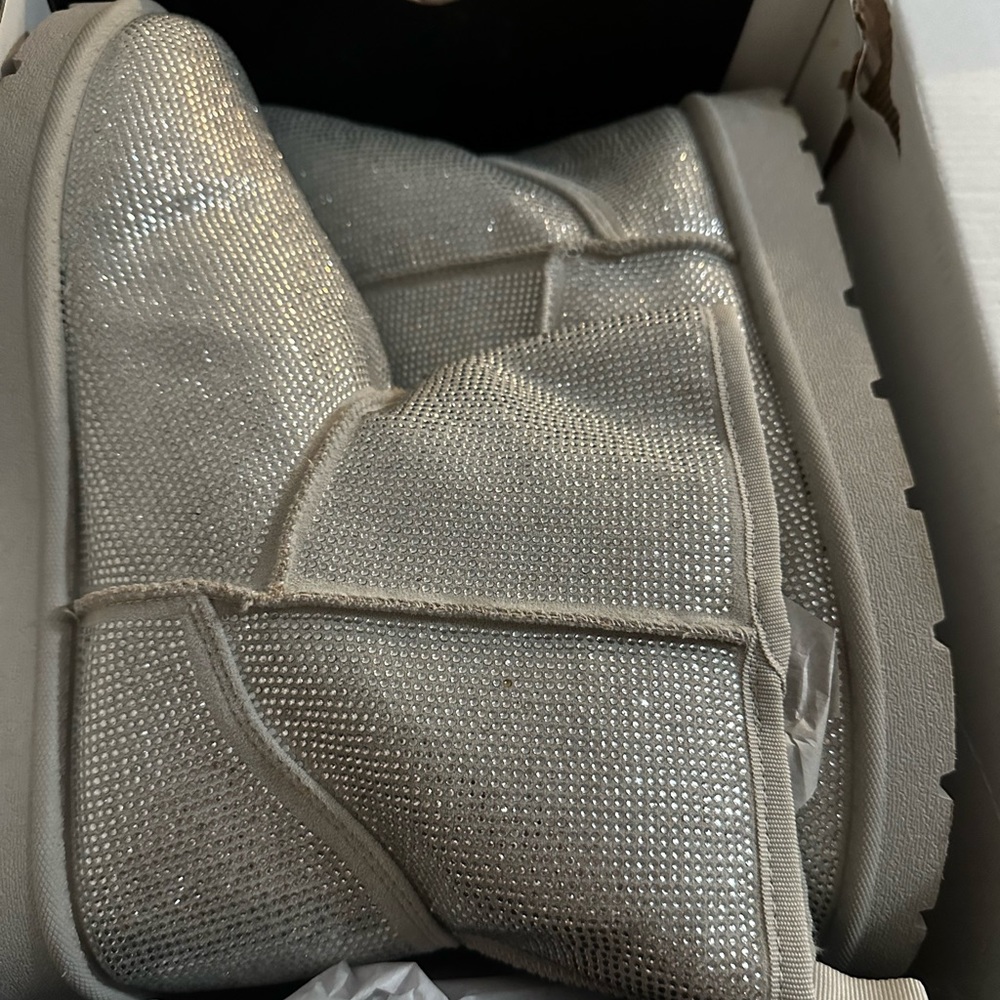 Brand new Torrid size 12 rhinestone snow boots. Very pretty!